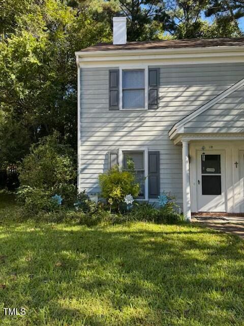 exterior space featuring a lawn