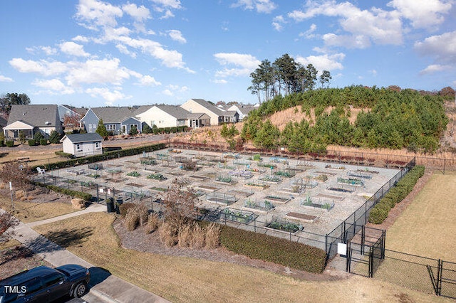 exterior space with a residential view and fence