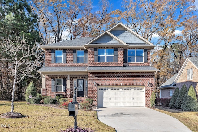 craftsman-style house featuring a garage and a front lawn