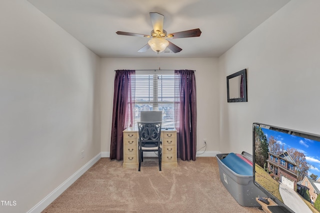 carpeted office with ceiling fan