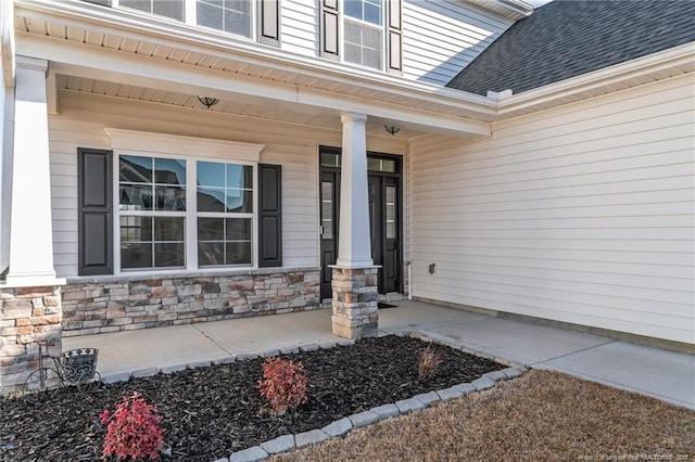 property entrance with a porch