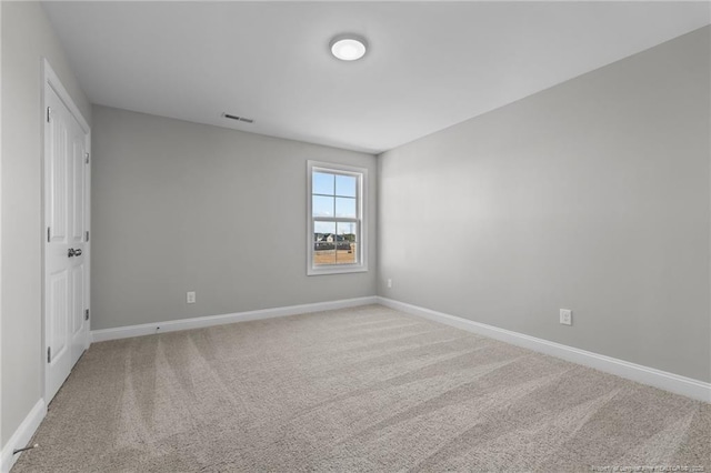 view of carpeted spare room