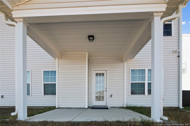 entrance to property with a patio area