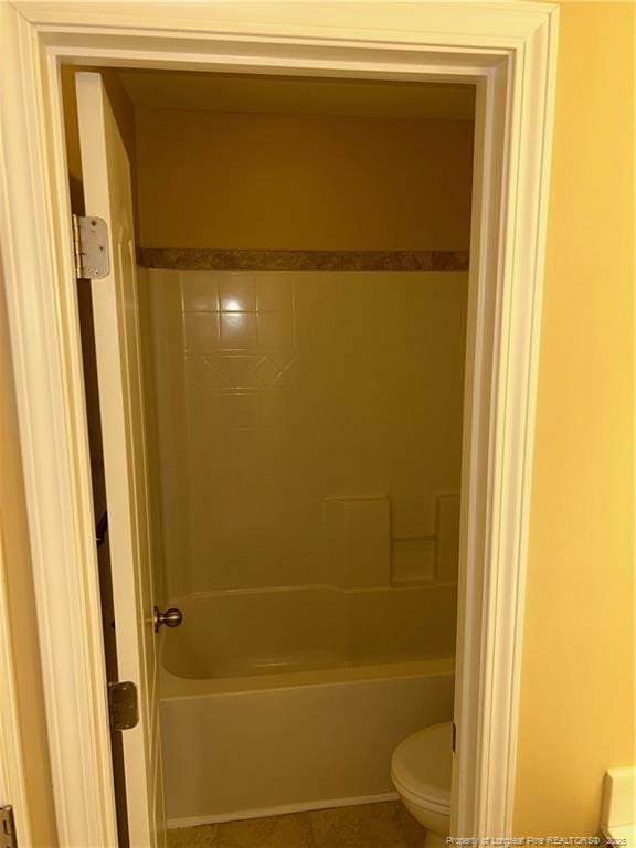 6605 Stillwood Dr, Hope Mills, NC 28348 - bathroom featuring toilet and shower / washtub combination
