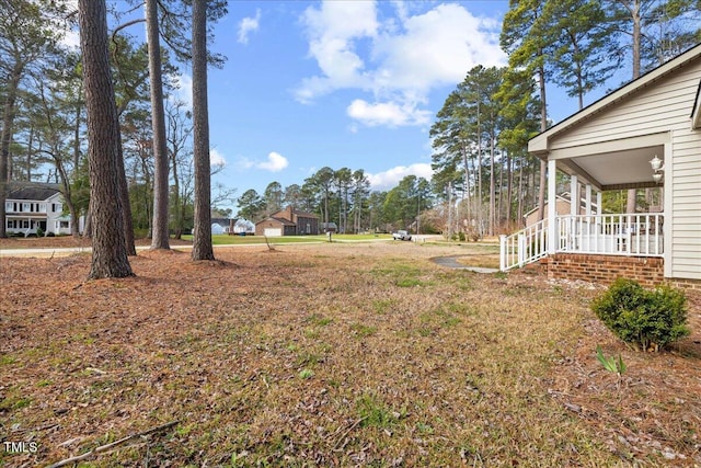 view of yard with a porch