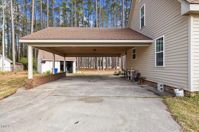 view of car parking featuring a carport