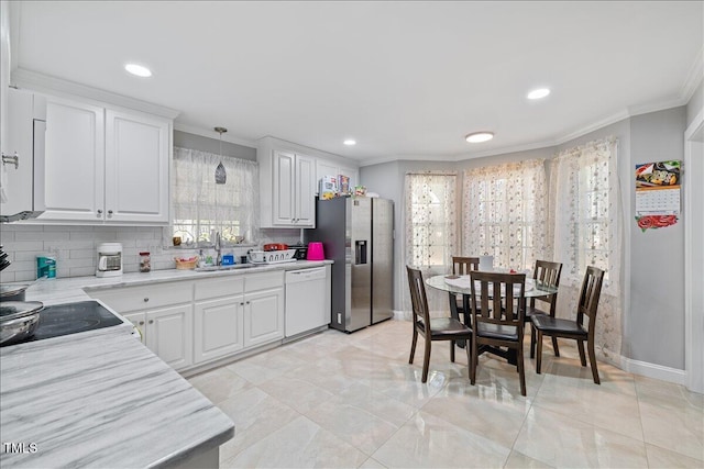 kitchen featuring dishwasher, white cabinetry, stainless steel fridge with ice dispenser, and decorative light fixtures