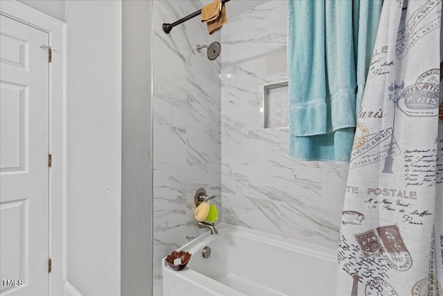 bathroom featuring shower / bath combo with shower curtain