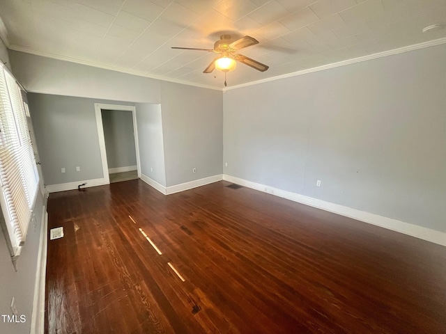 unfurnished room with dark hardwood / wood-style floors, ceiling fan, and ornamental molding