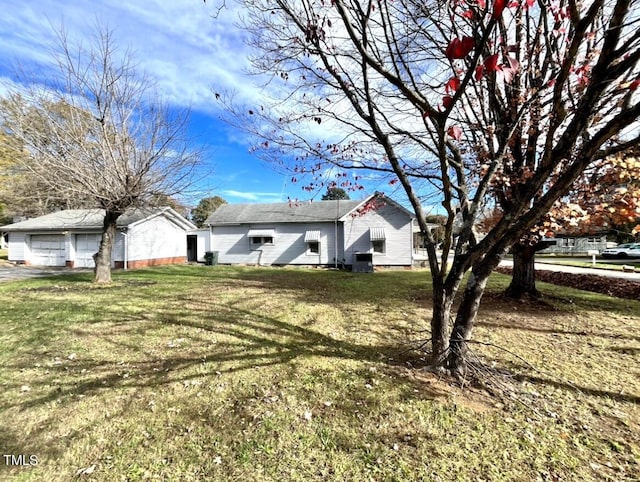 ranch-style house with a front lawn