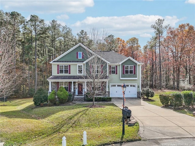 view of front facade featuring a front yard and a garage