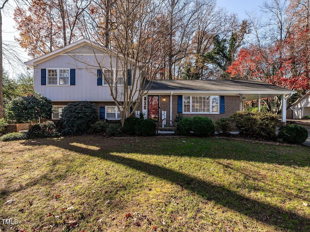 split level home featuring a front lawn