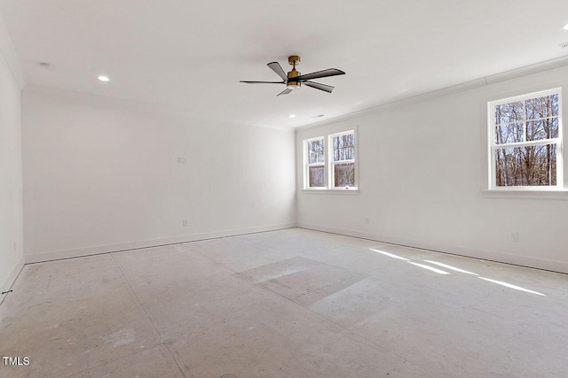 empty room featuring ceiling fan and ornamental molding