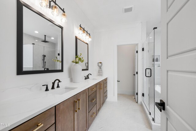 bathroom with marble finish floors, a stall shower, double vanity, and recessed lighting