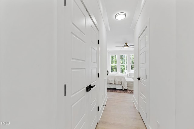 hall with light wood-style floors