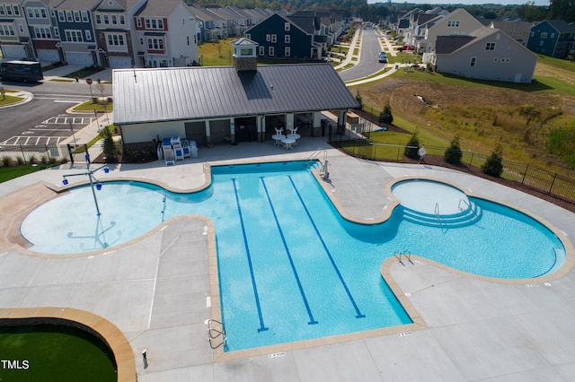 view of swimming pool with a patio