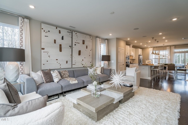 living room featuring dark hardwood / wood-style floors