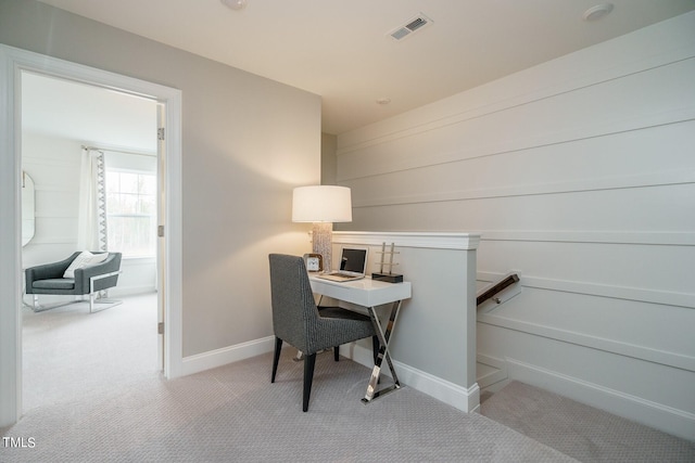 home office with light carpet