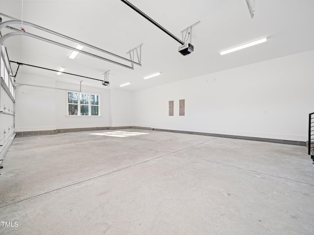 145 Wiggins Rd, Louisburg, NC 27549 - garage featuring a garage door opener and electric panel