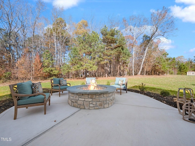 145 Wiggins Rd, Louisburg, NC 27549 - view of patio featuring a fire pit
