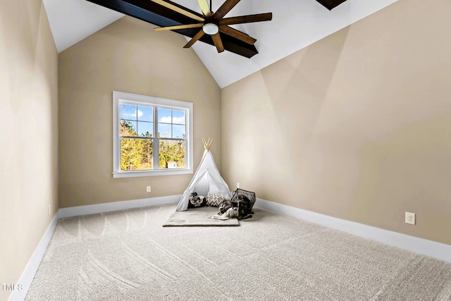 rec room with ceiling fan, carpet, and high vaulted ceiling