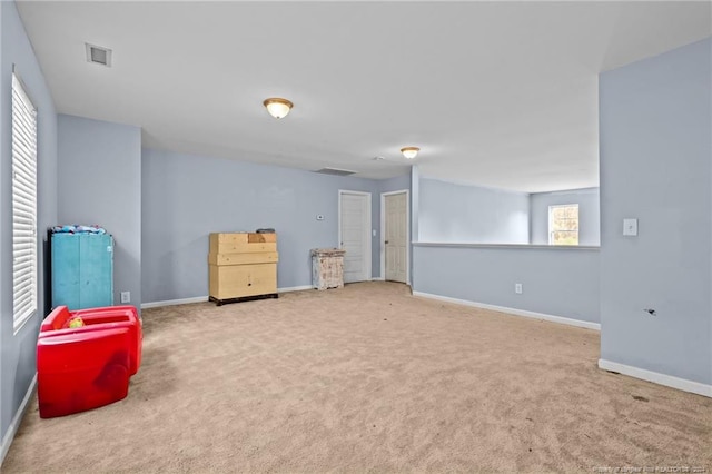 basement featuring carpet floors