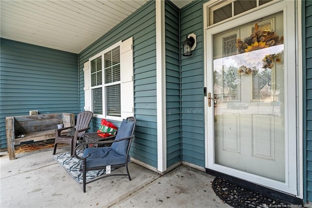 property entrance with covered porch