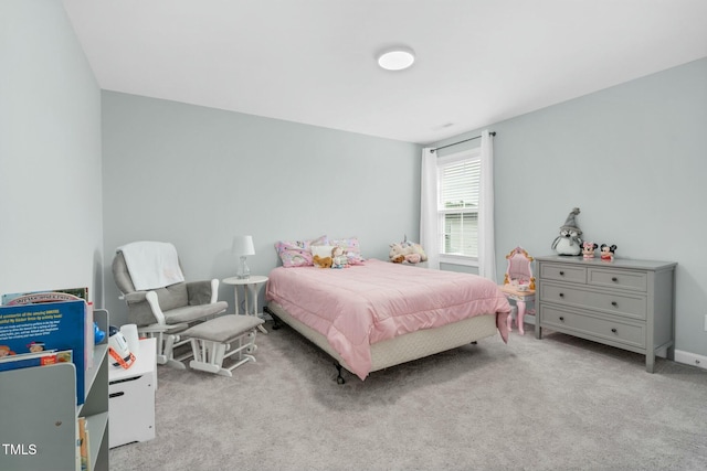 bedroom with light carpet