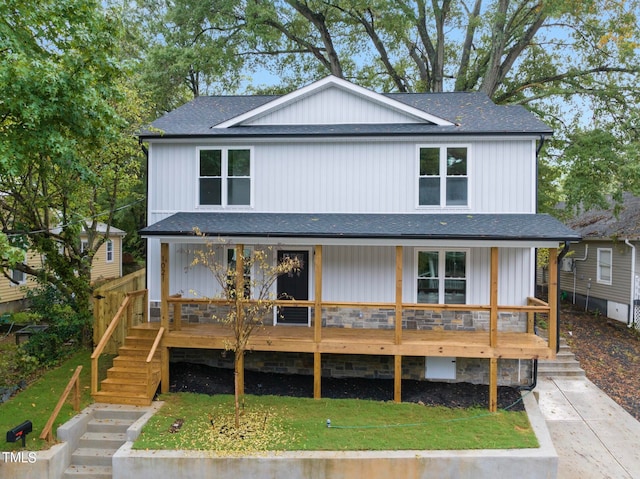 view of front of home with a deck