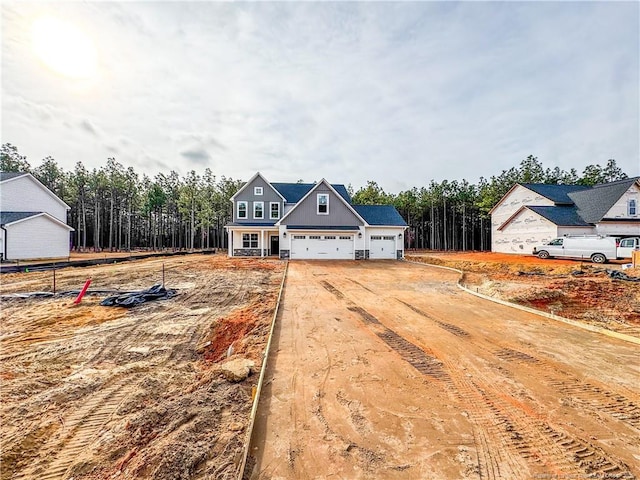 view of front of property with a garage