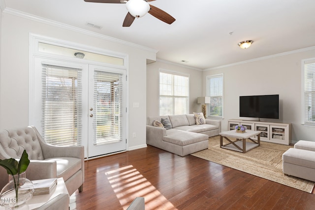 living room featuring crown molding, ceiling fan, and dark hardwood / wood-style floors