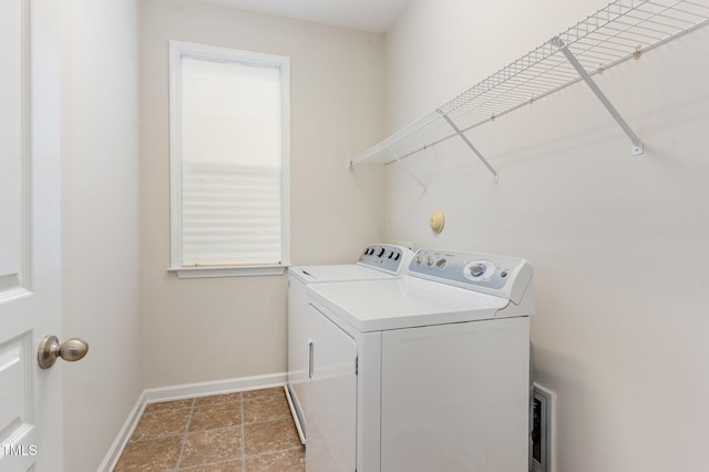 laundry area with washer and clothes dryer