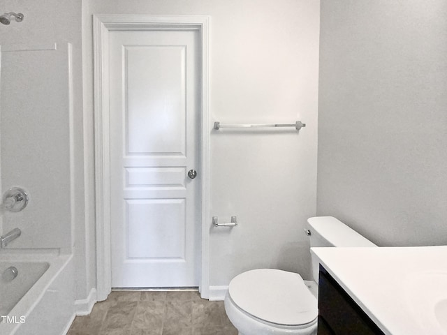 full bathroom featuring shower / bathing tub combination, vanity, and toilet