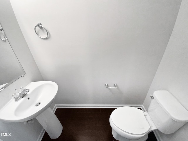 bathroom featuring toilet