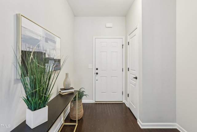 interior space with dark hardwood / wood-style flooring