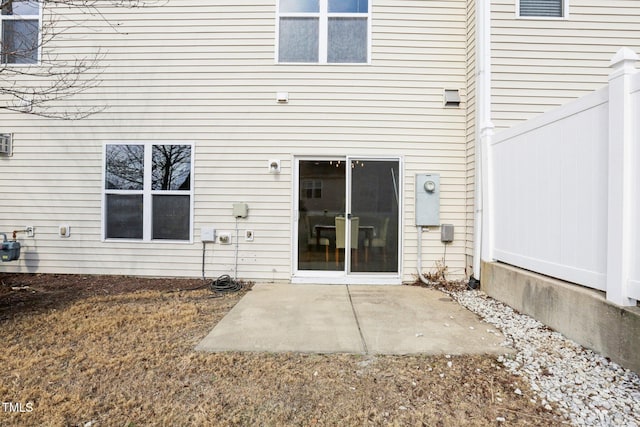 back of property featuring a patio area