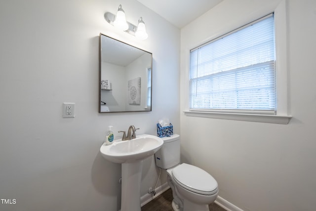 bathroom with toilet and sink