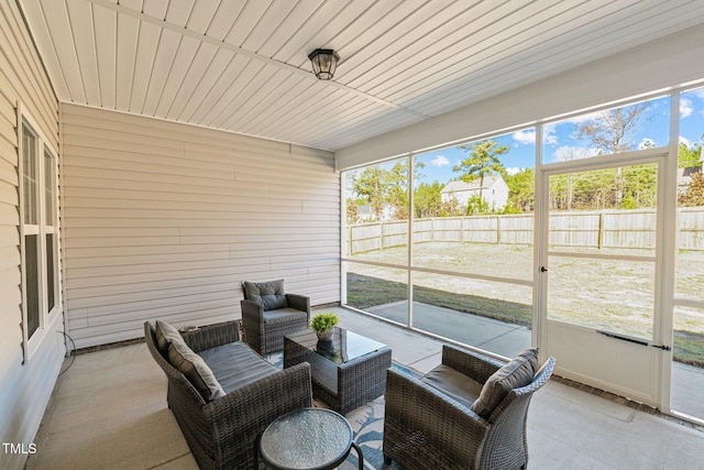 sunroom with wood ceiling