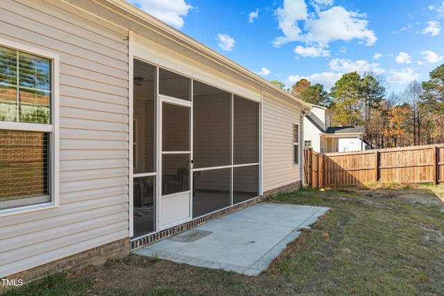 view of yard with a patio and a sunroom