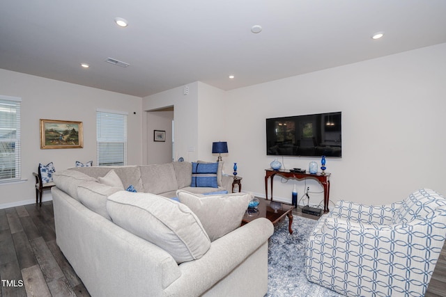 living room with dark hardwood / wood-style floors