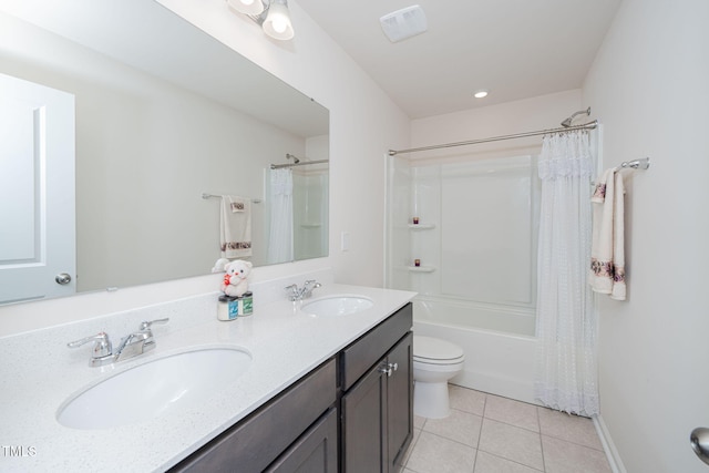 full bathroom featuring tile patterned floors, vanity, shower / bath combination with curtain, and toilet