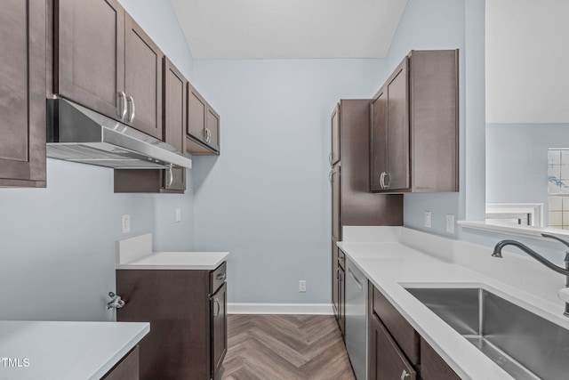 kitchen with dishwasher, sink, dark parquet floors, and dark brown cabinets