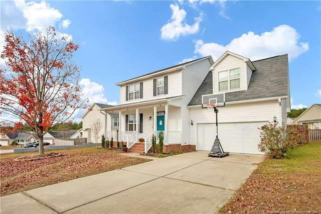 front facade with a garage and a front lawn