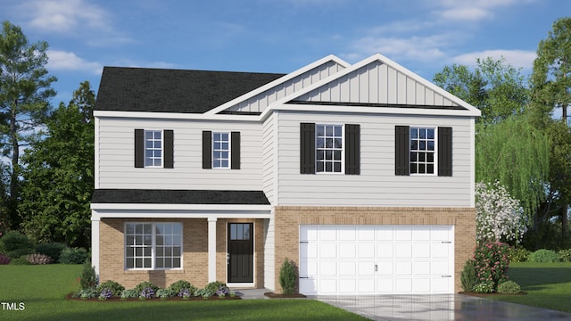 view of front of house featuring a front yard and a garage