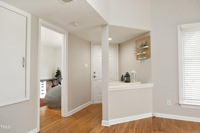 interior space with hardwood / wood-style floors