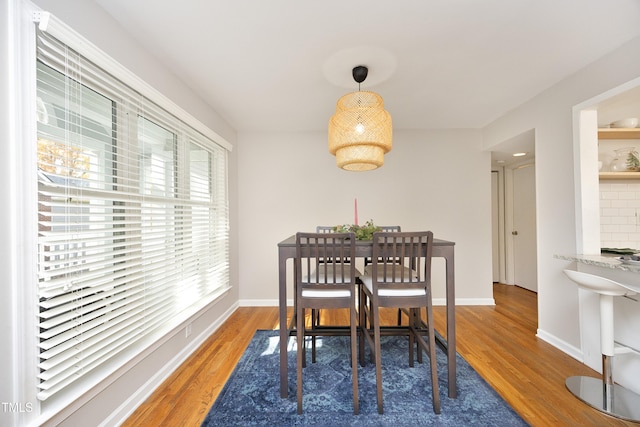 dining area featuring hardwood / wood-style flooring