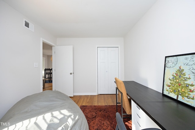 bedroom featuring wood-type flooring