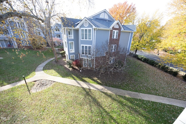 exterior space featuring a lawn