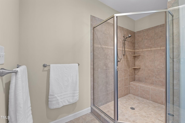 bathroom featuring tile patterned floors and walk in shower