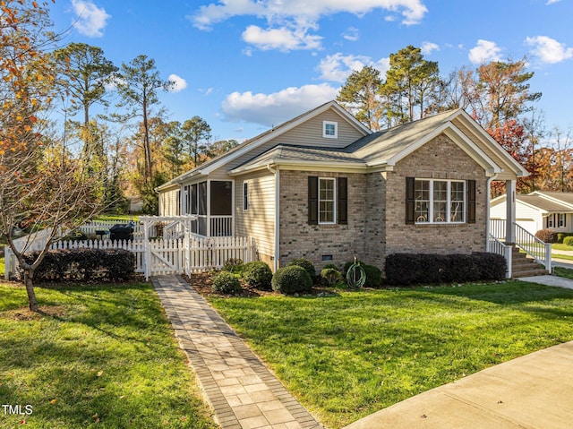 bungalow-style home with a front lawn